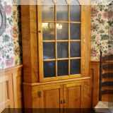F03. Eldred Wheeler glazed tiger maple corner cupboard. 82”h x 45”w x 31”d
